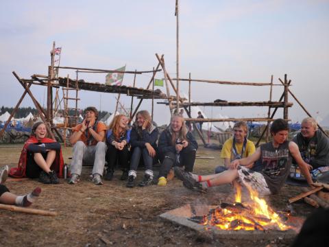 Scouts sitting around the campfire